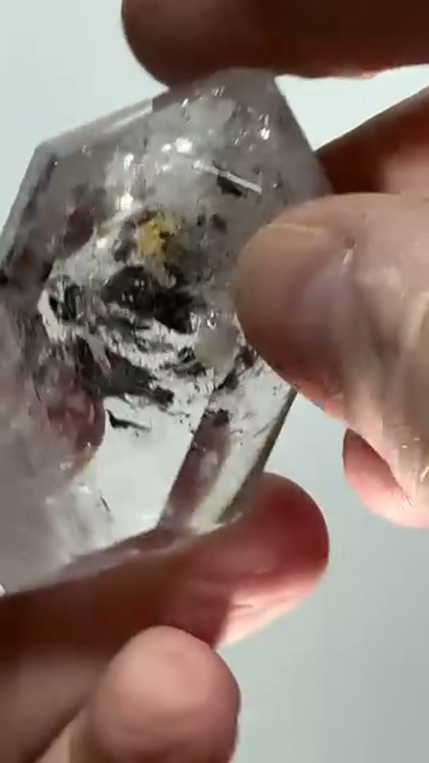 So cool, clear quartz w enhydros and falling carbon