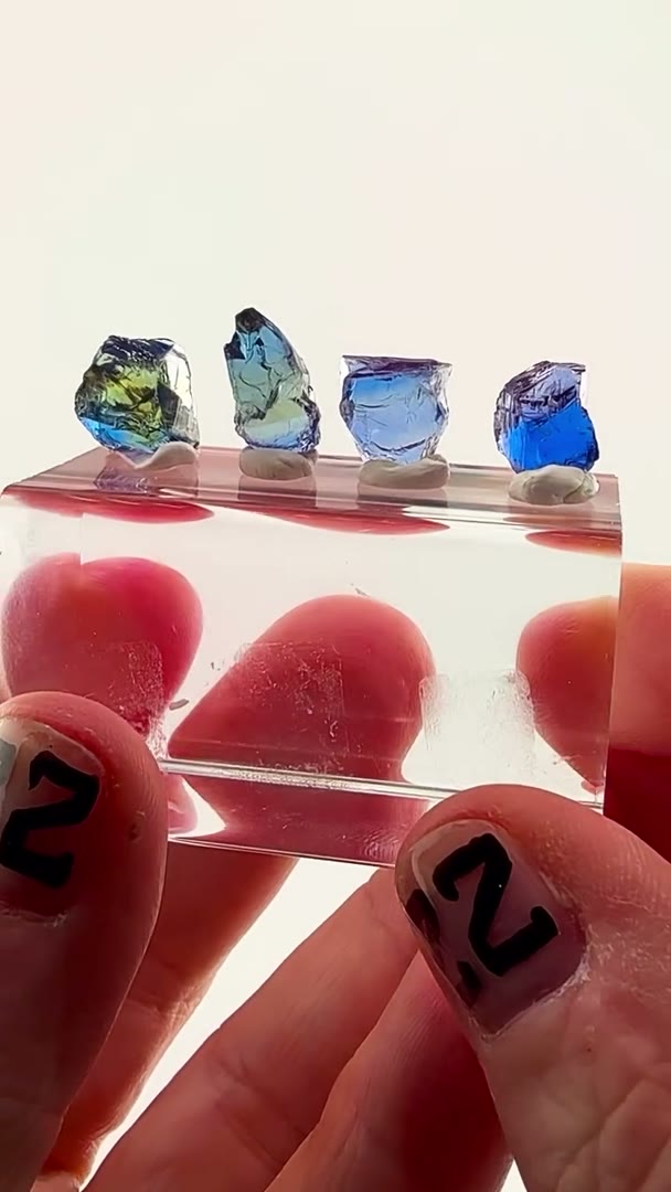 Four natural, unheated Tanzanite crystals… each one completely unique, each…